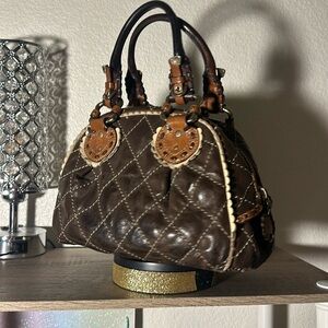 Juicy Couture brown leather quilted bowling bag